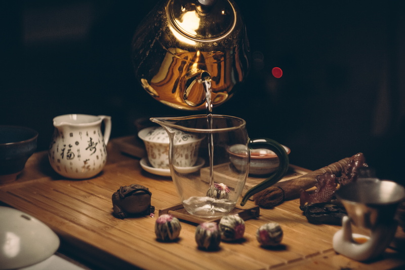 tableware, indoors, transparent, water, wood - material, hot drink, drink, still life, close-up, mug, dark, food and drink, pour, wood, vintage, cup, teapot