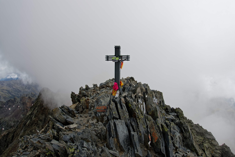 giant, formation, clothing, rock, beauty in nature, 3000m, ground, fire hydrant, low angle view, belief, tranquility, scenics - nature, cross, outdoors