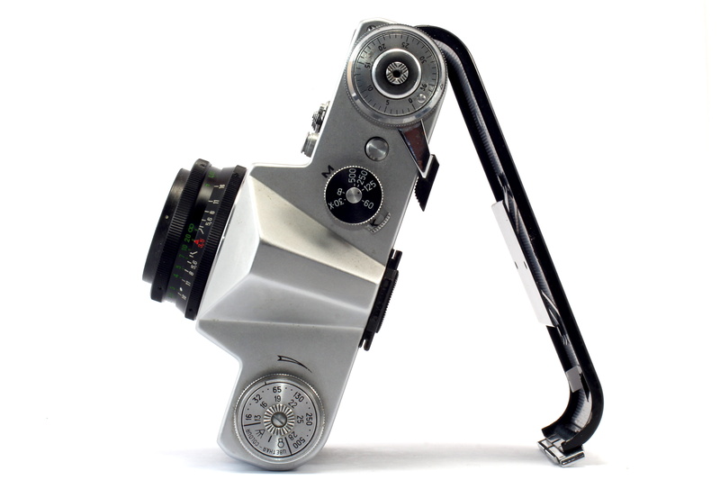 indoors, single object, technology, film industry, white background, analog, black color, lens - optical instrument, no people, lens, close-up, camera