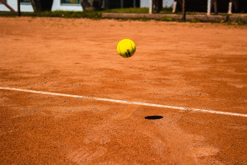 austria, shadow, playing, ball, human, match - sport, team, motion, bouncing, person, bounce, sunlight, sports equipment, no people, line, skill, tennis ball
