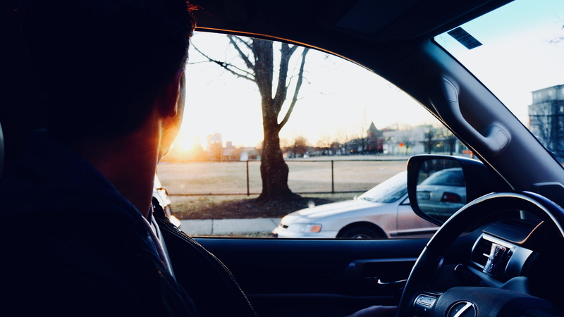 glass - material, windshield, motor vehicle, sunlight, travel, 4K, indoors, window, sunset, sitting, vehicle, riding, car interior, man, steering wheel