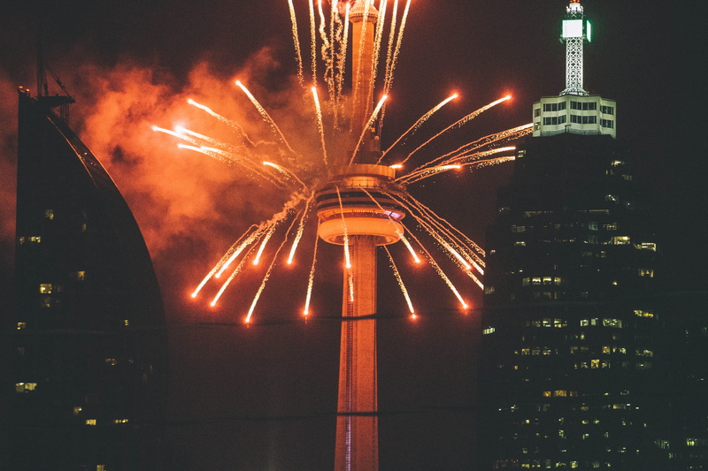 city, skyscraper, space, sky, fireworks, building, smoke, built structure, event, light, blasted, lights, motion, needle, architecture, fire, outdoors