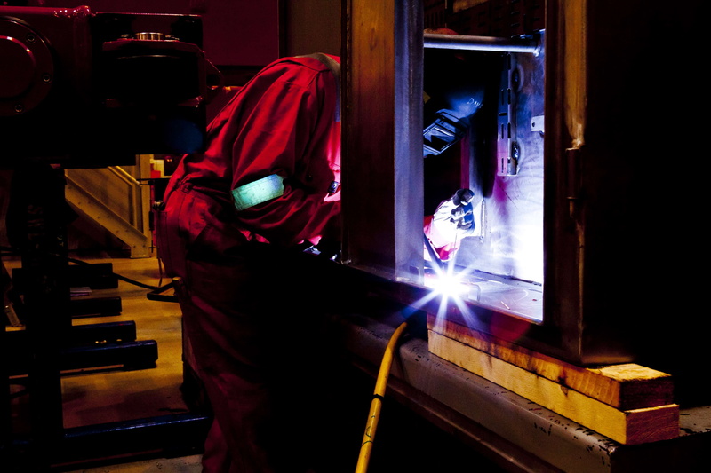 working, occupation, holding, flame, blur, industry, obscured face, workshop, men, home interior, real people, lifestyles, casual clothing, women, man