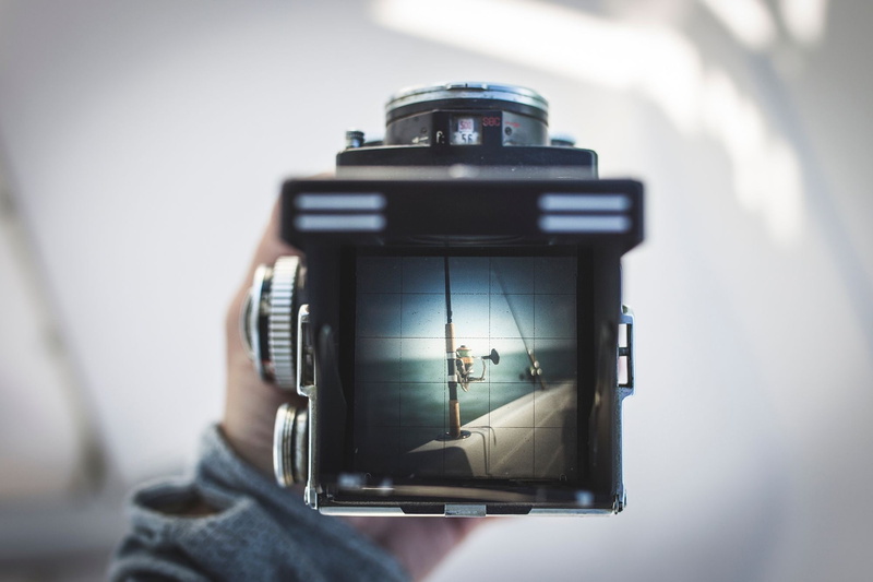 photography themes, focus on foreground, screen, digital single-lens reflex camera, real people, close-up, wireless technology, activity, depth of field