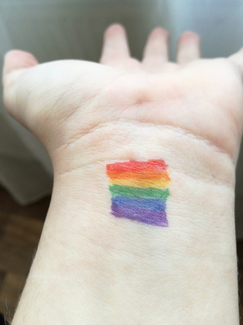 personal perspective, one person, rainbow, body part, creativity, lgbt, indoors, art and craft, human finger, selective focus, real people, wool, color