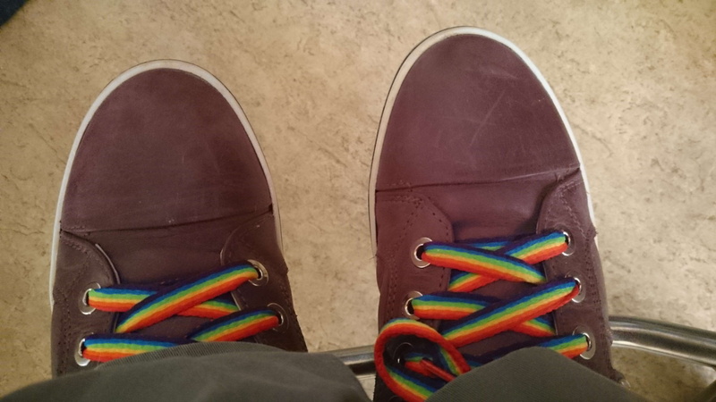 feet, sports equipment, still life, wheelchair, transgender, pride, rainbow, indoors, high angle view, man, absence, shoelaces, disabled, no people, compatibility