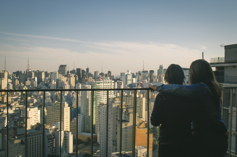 woman, couple, landscape, colorful, daylight, looking at view, lgbtq, modern, people, skyscrapers, outdoors, adult, sky, togetherness, office building exterior