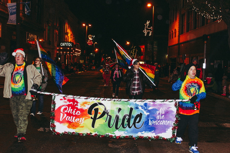 real people, colors, city life, nightlife, wear, action, architecture, people, standing, banner, ceremony, pride, celebration, multi colored, street, built structure