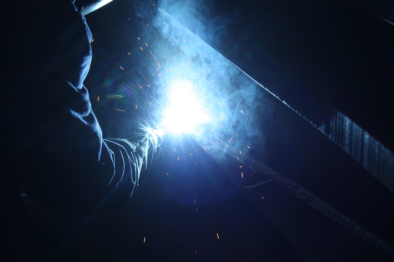 metal industry, occupation, popular music concert, men, 4K, real people, skill, low angle view, enjoyment, sparks, welding, light, night, light - natural phenomenon