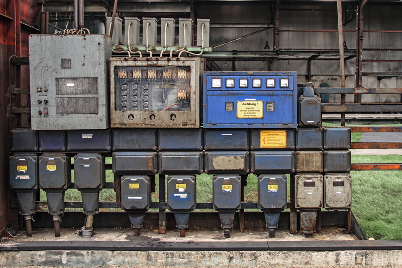 day, outdoors, electricity, metal, no people, old, current, built structure, architecture, power supply, industry, technology, in a row, text, group, stack
