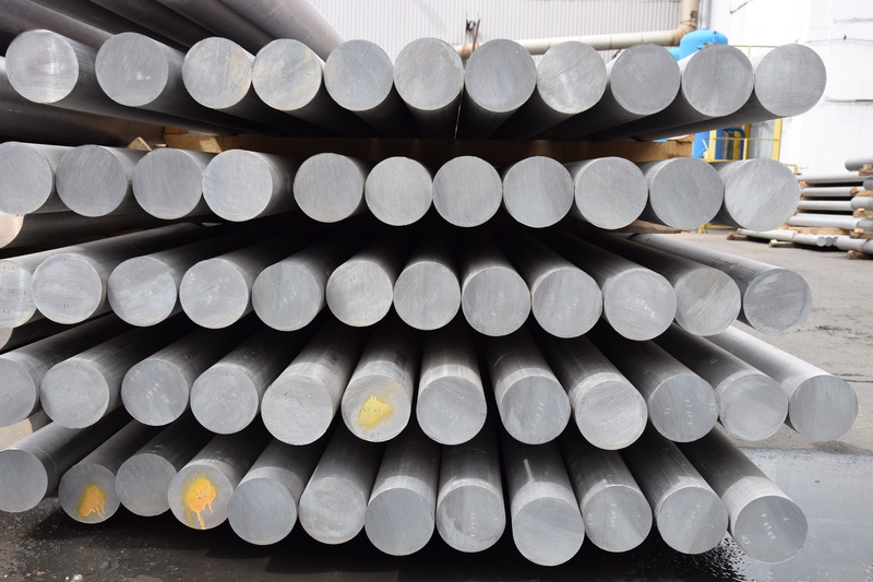 pattern, circle, repetition, shape, metallurgy, stack, arrangement, day, side by side, white color, industry, large group of objects, factory, no people