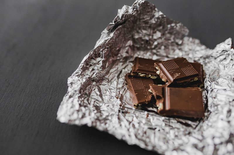 bars, gray, indoors, chocolate bar, snow, table, sweets, selective focus, ready-to-eat, food and drink, close-up, chocolate bars, sweet food, indulgence