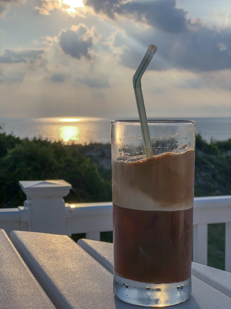 sunset, table, focus on foreground, sea, coffee, cloud - sky, food and drink, drinking glass, ice coffee, day, household equipment, freshness, refreshment