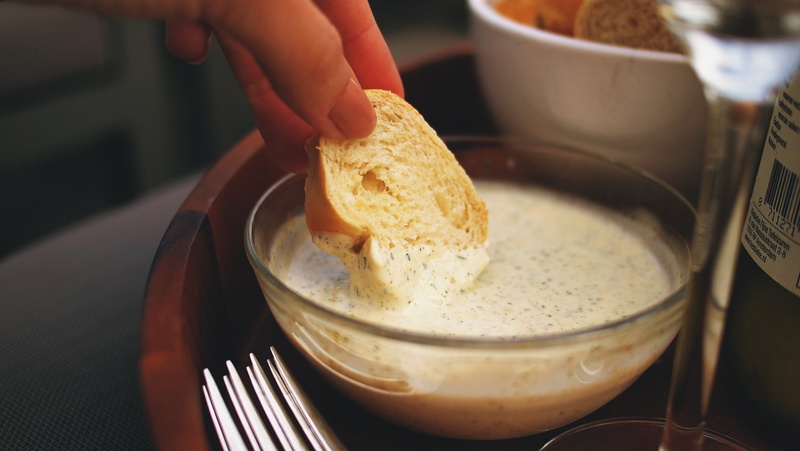 garlic, food, preparation, healthy eating, sauce, person, eat, one person, bread, ingredient, kitchen utensil, dip, indoors, sliced, women, cream, cuisine