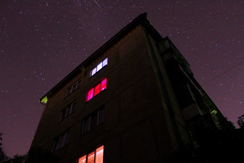 low angle view, universe, star, building, city, tower, night, shelter, space and astronomy, night life, office building, built structure, stare, nature