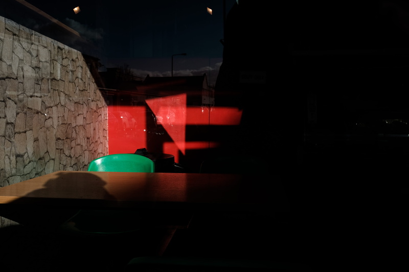 sunlight, wall - building feature, still life, outdoors, no people, table, sphere, restaurant, bar - drink establishment, urban, illuminated, brick, absence
