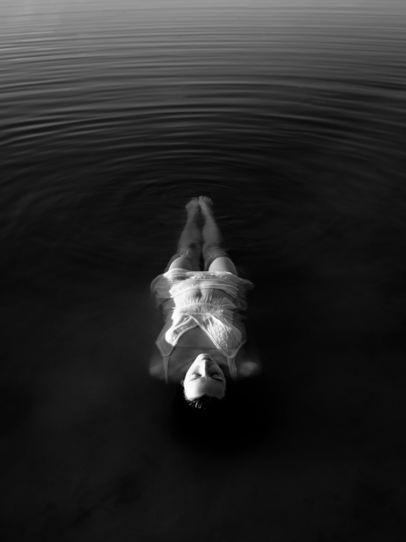 underwater, dress, people, human body part, one person, black and white, women, swimming, nature, skill, light, water, wearing, floating on water, body