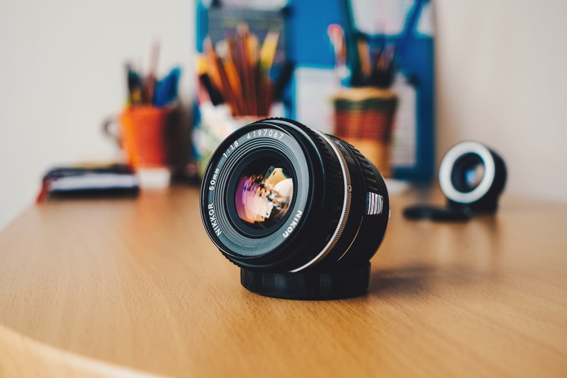 photographer, camera - Photographic Equipment, film reel, table, digital camera, Camera lens, lens - Optical Instrument, close-up, film industry, photographic Equipment