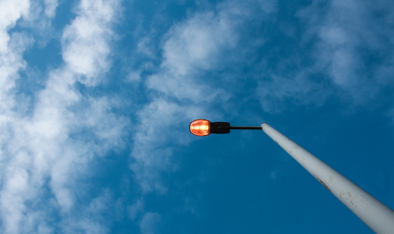 environment, cloud - sky, summer, electric lamp, bright, single object, directly below, day, blue sky, outdoors, technology, low angle view, lit, street light