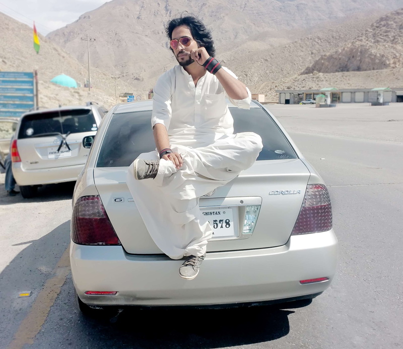 casual clothing, young men, front view, accounting, day, alone, 52 cadillac, lover boy, n ganoko, motor vehicle, leisure activity, road, men, outdoors