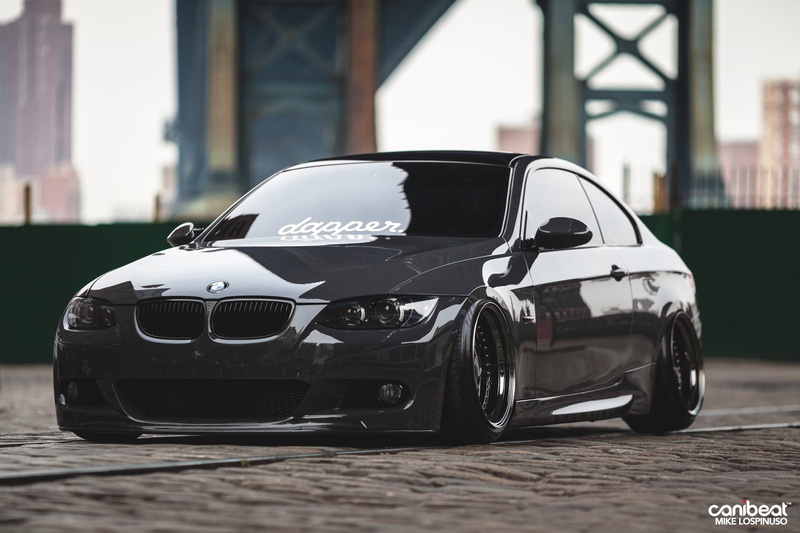 focus on foreground, day, black color, sports car, mode of transportation, transportation, black, built structure, 1080P, luxury, car, close-up, motor vehicle