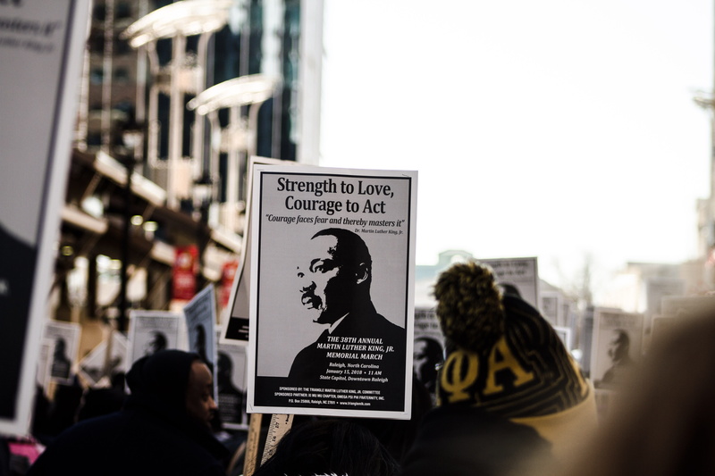 people, demonstration, photography, poster, women, sign, urban, text, street, placard, human representation, crowd, city, strength, adult, real people
