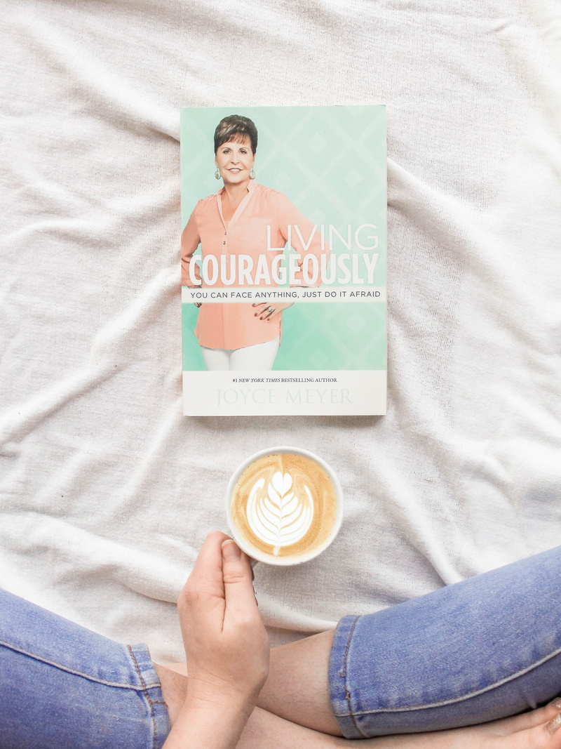 living, adult, cup, indoors, drink, real people, massage, paper, latte, coffee cup, human, beverage, furniture, advertisement, food and drink, casual clothing