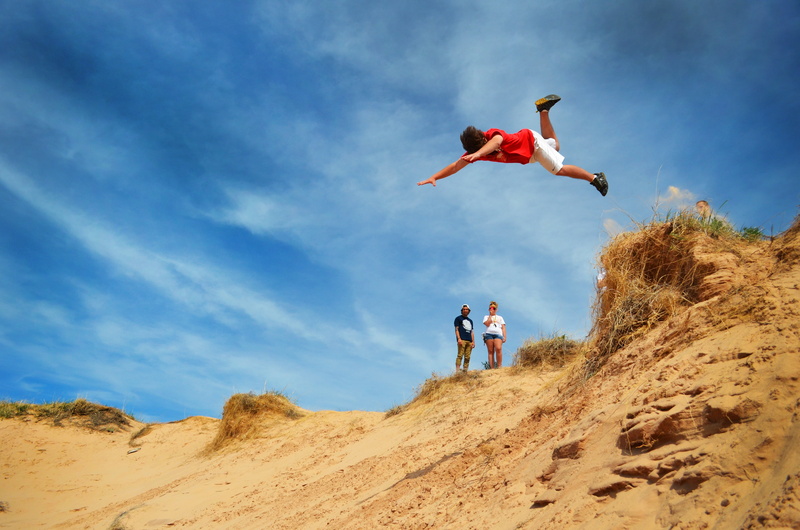 women, jumping off, togetherness, dom, males, fly, group of people, excitement, high, full length, day, cliff, land, fall, motion, adult, diving, leisure activity