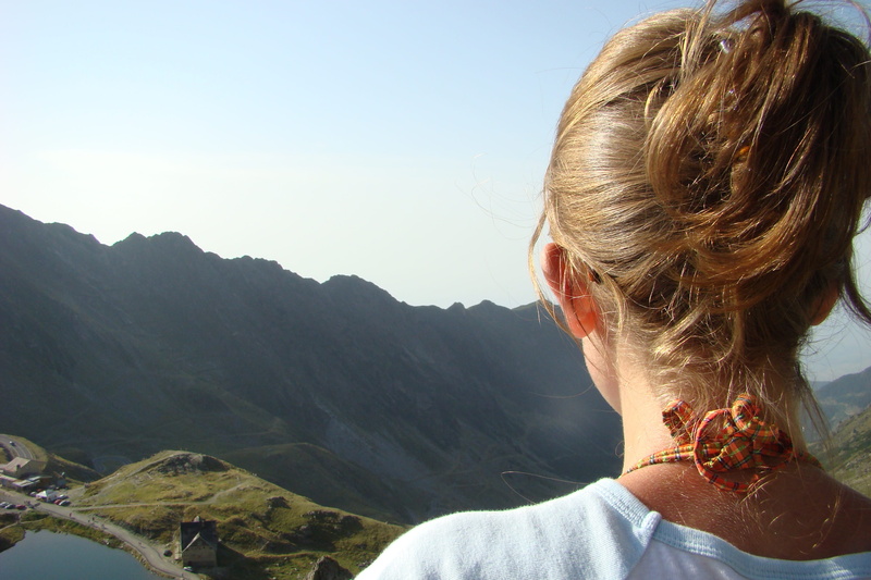 leisure activity, young adult, beauty in nature, hair, blond hair, looking at view, mountain range, achievement, green, portrait, facing, human hair, hiking
