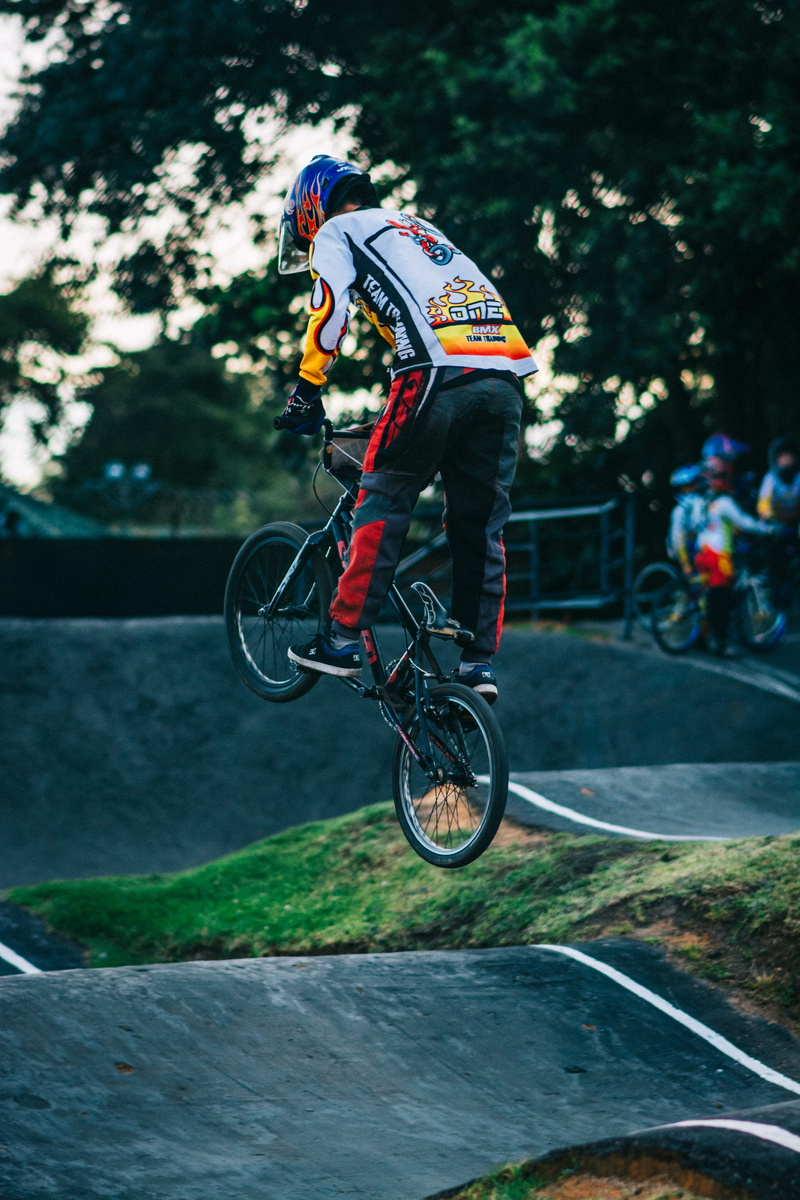 riding, land vehicle, helmet, clothing, extreme, men, apparel, bmx, bike, crash helmet, sports clothing, mode of transportation, nature, plant, headwear