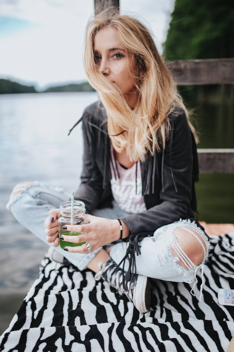 jacket, real people, adults only, pier, leisure activity, young Adult, beautiful, blond Hair, only women, drink, adult, people, ripped, one Person, outdoors