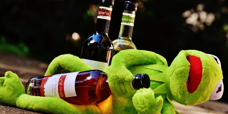 container, focus on foreground, green color, france, glass - material, day, celebration, figure, no people, close-up, spain, refreshment, frogs, beer bottle