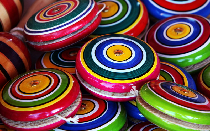 indoors, colorful, yo-yo, high angle view, choice, design, full frame, stack, for sale, multi colored, the principle, variation, pendulum, rotation, rope