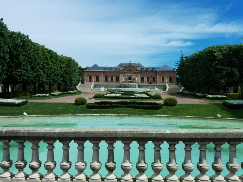 outdoors, sky, day, mansion, green color, railing, nature, 2K, architecture, formal garden, water, barcelona, palau san jordi, no people, tree, building