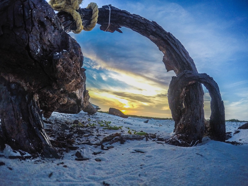 tranquil scene, rock, beauty in nature, no people, scenics - nature, venezuela, ocean, beach, solid, land, outdoors, sky, gopro, body of water, sun, sunset