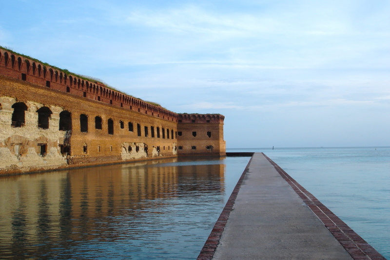 day, sea, brown, near, architecture, ocean, building exterior, landmark, nature, tranquil scene, cloud - sky, fort jefferson, structure, walkway, reflections