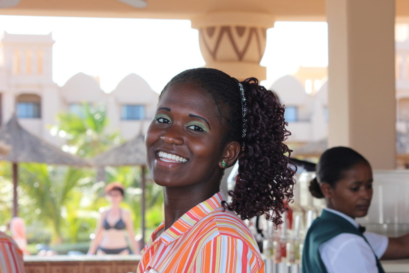 white, people, casual clothing, adult, focus on foreground, cape verde, incidental people, architecture, beautiful woman, headshot, emotion, post, happiness
