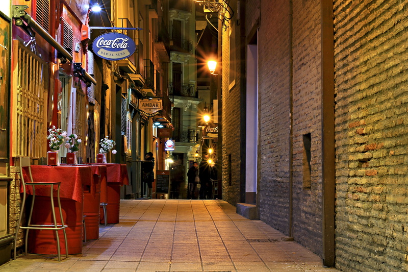 wine, lunch, meat, building exterior, tavern, built structure, urban, pub, bar, beer, lighting equipment, salad, alley, top, footpath, tables, perspective