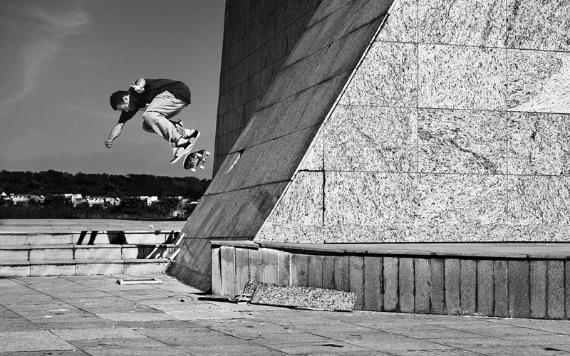 built structure, nature, outdoors, skill, 1080P, real people, city, jumping, monochrome, stunt, architecture, skateboard, day, sport, lifestyles, leisure activity