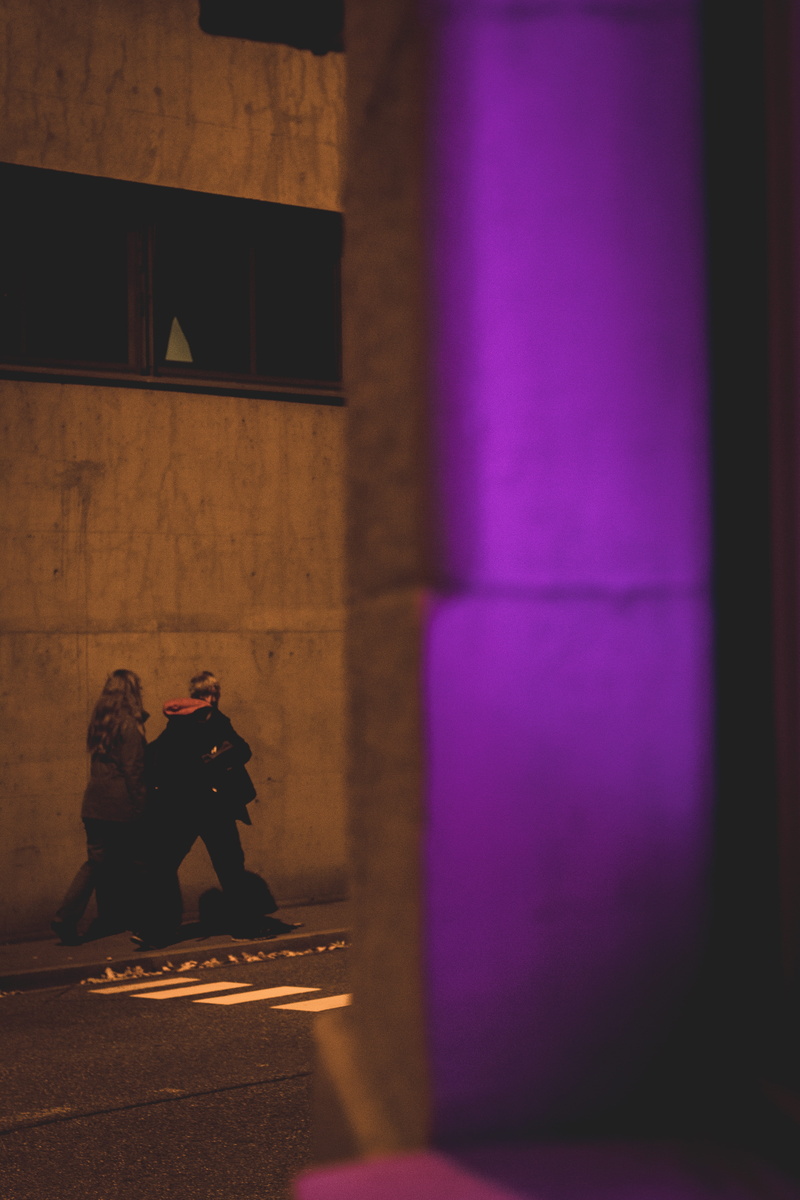 outdoors, walks, building, togetherness, person, floor, night, architecture, day, night time, bonding, neon light, wall - building feature, concrete, vintage