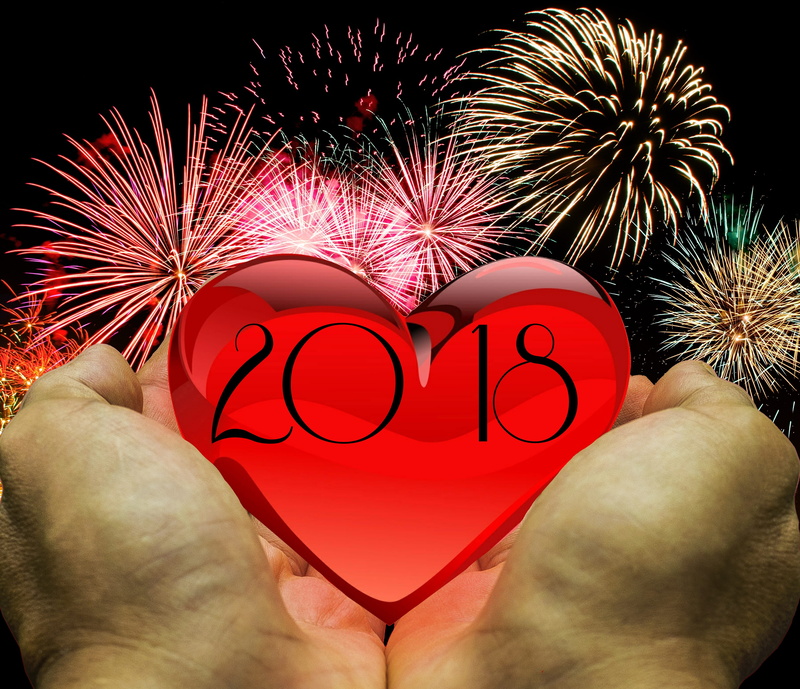 leisure activity, heart shape, holding, 2018, human limb, hand, new years eve, firework display, overlay, event, digital composite, real people, human hand
