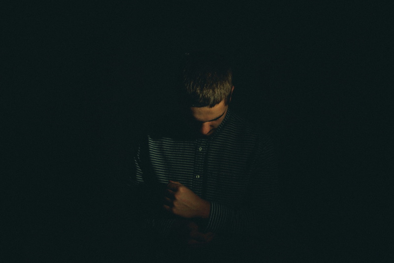 low, studio Shot, real people, adults only, cut out, people, one Person, waist up, portrait, person, males, 4K, man in gray, indoors, darkroom, depression - sadness
