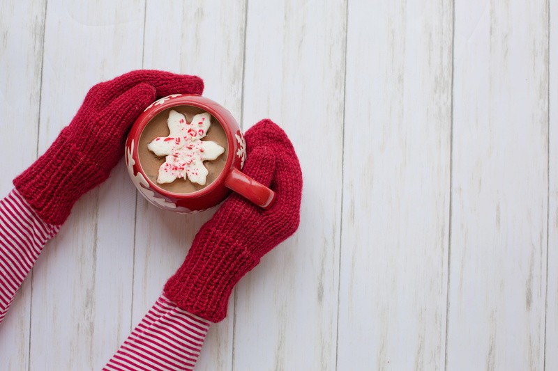 white color, hand, red, scarf, text space, lifestyles, day, warm, wall - building feature, 5K, cosy, real people, hat, clothing, women, hot chocolate