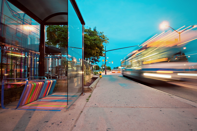 transport, stop, street, blurred motion, colorful, bus stop, on the move, track, light, transportation system, sidewalk, building exterior, timelapse, urban