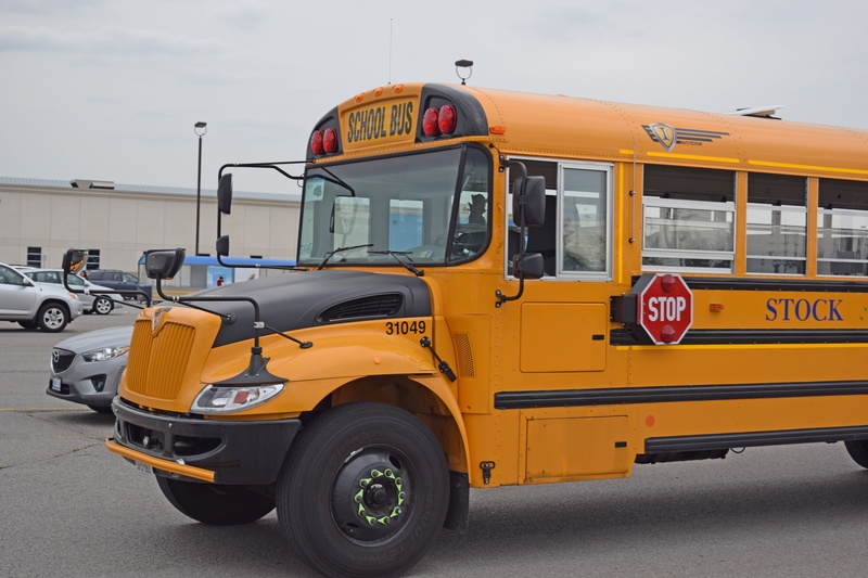 road, motor vehicle, no people, city, stationary, school bus, school, street, taxi, transportation, bus, automobile, text, 5K, architecture, yellow, land vehicle