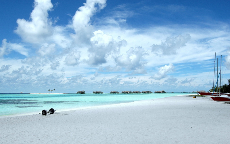 scenics - nature, incidental people, bungalow, tranquil scene, water, land, tropical, day, horizon over water, 2K, sea, turquoise colored, horizon, sand