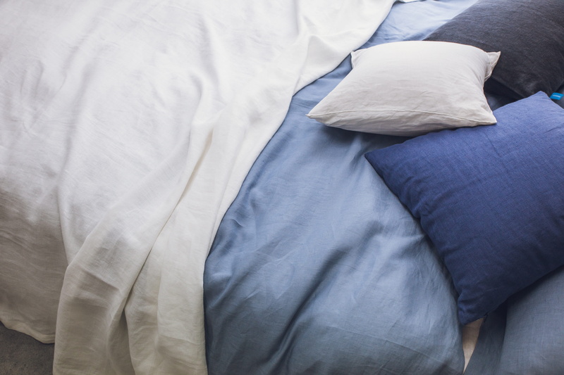 bed, linen, one person, blue, coverlet, bedroom, relaxation, high angle view, furniture, human body part, 5K, summer blanket, sheet, casual clothing, close-up