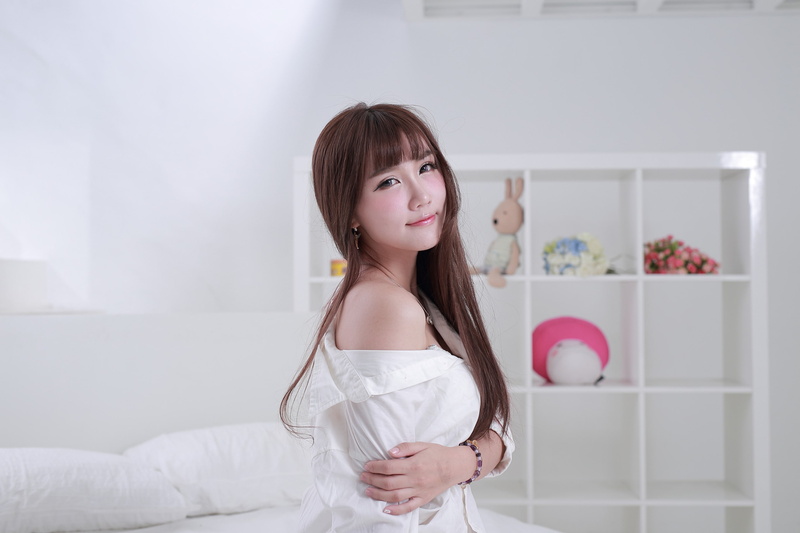 young adult, beautiful woman, standing, hairstyle, contemplation, looking at viewer, portrait, waist up, indoors, hair, young women, long hair, straight hair
