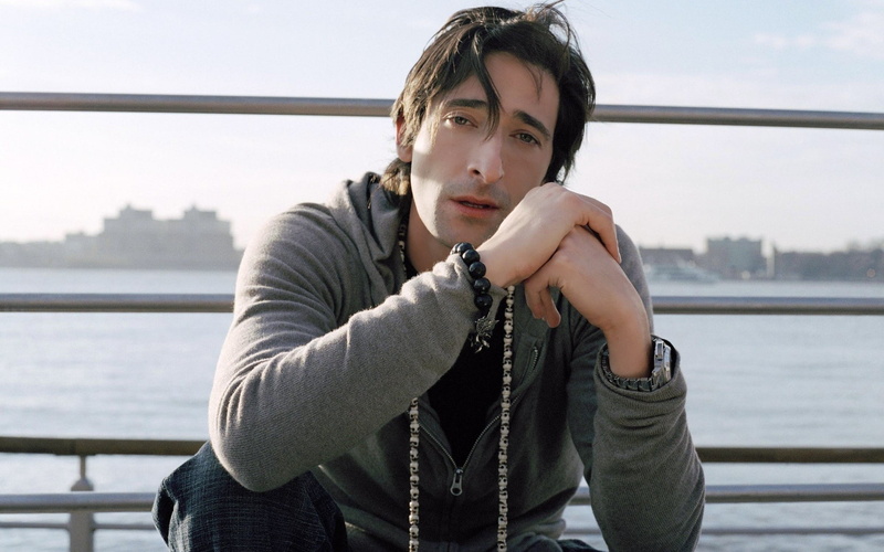 river, adult, outdoors, front view, contemplation, 1080P, Serious, clothing, Adrien brody, Eyes, city, waist up, railing, sky, one person, nature, water