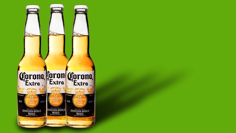 glass, copy space, glass - material, no people, green color, alcohol, corona, container, still life, wine bottle, food, beer, food and drink, drink, mexican beer